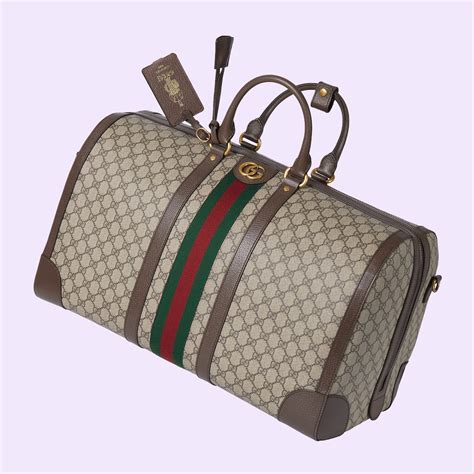faux sac de voyage gucci